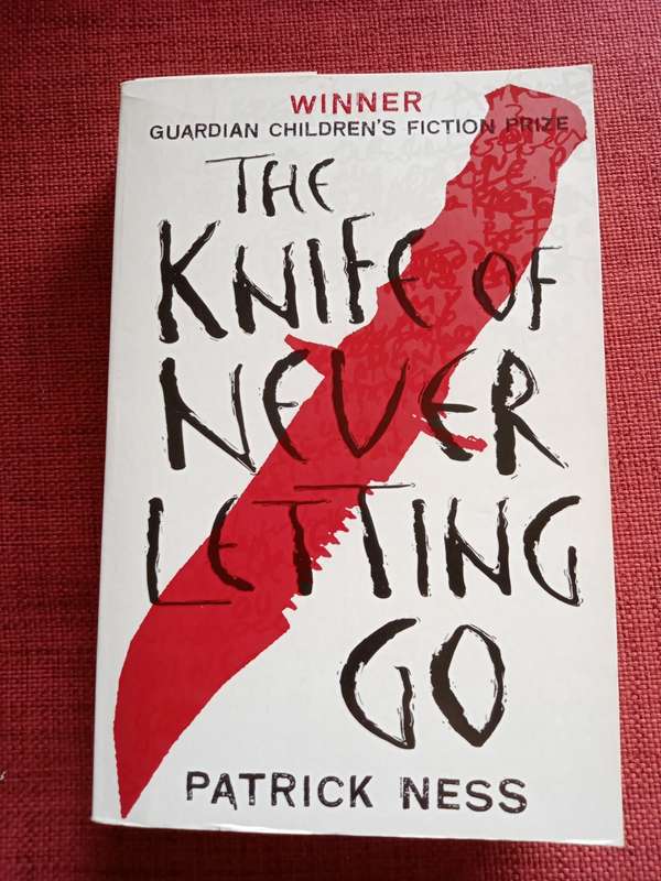 The Knife of Never Letting Go by Patrick Ness. First edition 2008. Softcover. 479 pp.