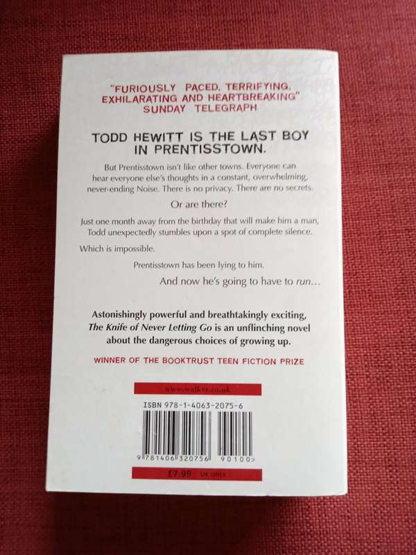 The Knife of Never Letting Go by Patrick Ness. First edition 2008. Softcover. 479 pp.