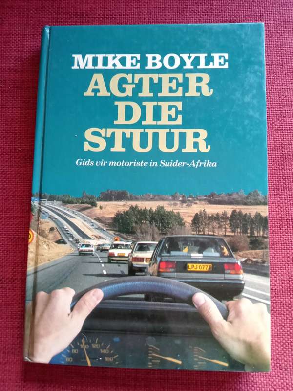 Agter die Stuur deur Mike Boyle. Eerste uitgawe 1989. Hardeband. 176 pp.