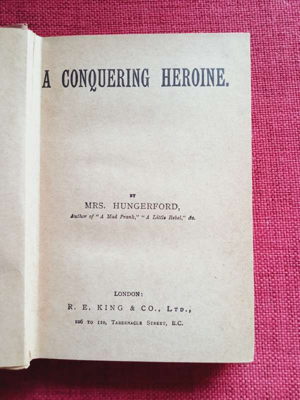A Conquering Heroine by Mrs Hungerford. Circa 1890. Hardcover. Small format. 102 pp.