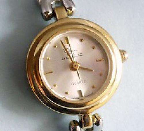 AUTHENTIC OSCAR DE LA RENTA LADIES GOLD/SILVER QUARTZ SER NO. 294-5Y30