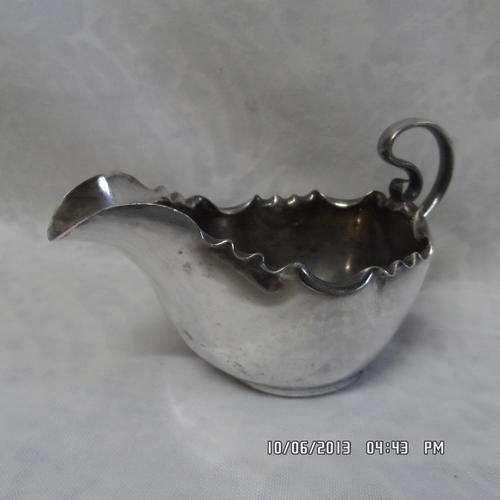 A BEAUTIFULLY  FRILLY EDGED 'SAUCE' BOAT/JUG