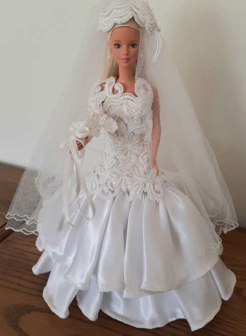 Floral Tulip wedding dress with long bodice on Barbie