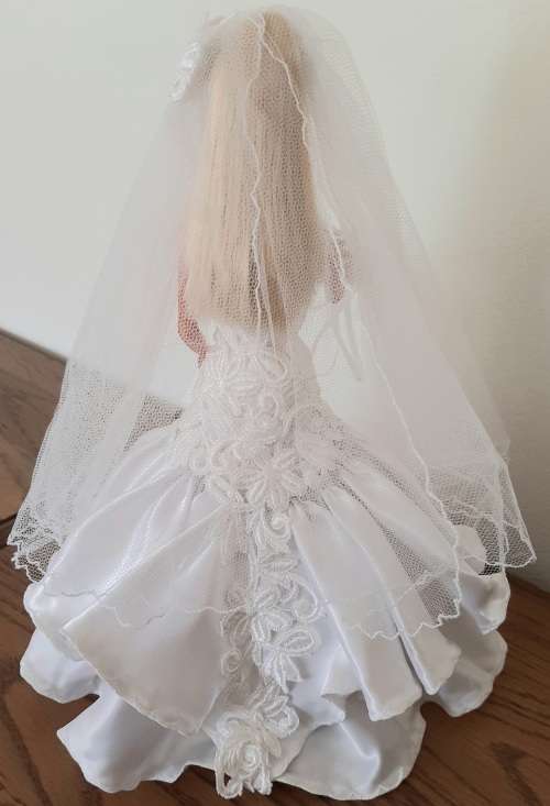 Floral Tulip wedding dress with long bodice on Barbie