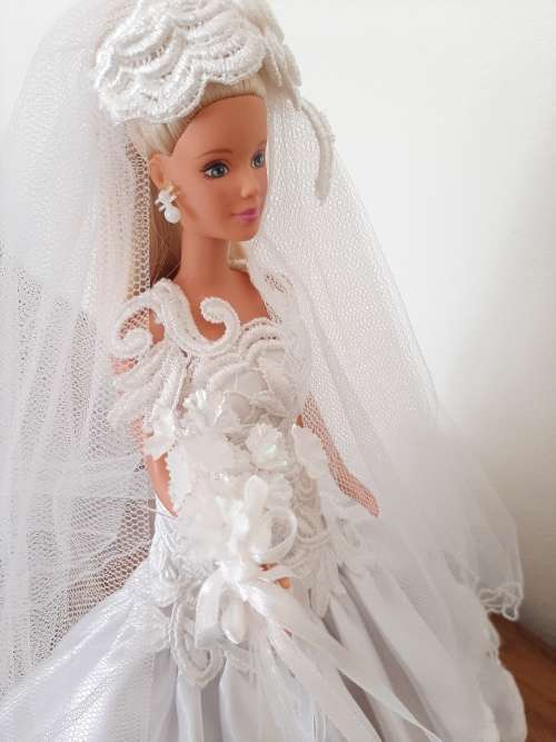 Floral Tulip wedding dress with long bodice on Barbie