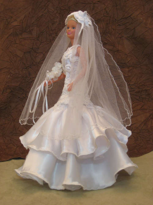 Floral Tulip wedding dress with long bodice on Barbie