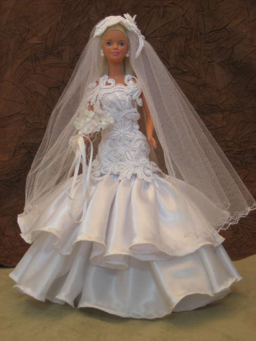 Floral Tulip wedding dress with long bodice on Barbie