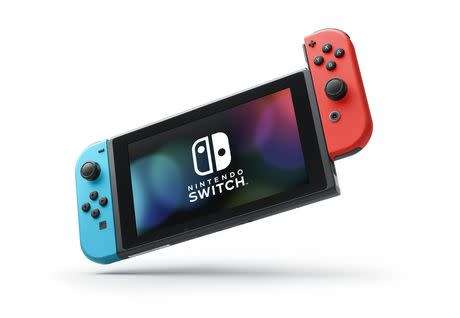 Nintendo Switch Console (With Neon Red And Neon Blue Joy-Con) + Extras