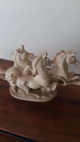 Statue of galloping horses