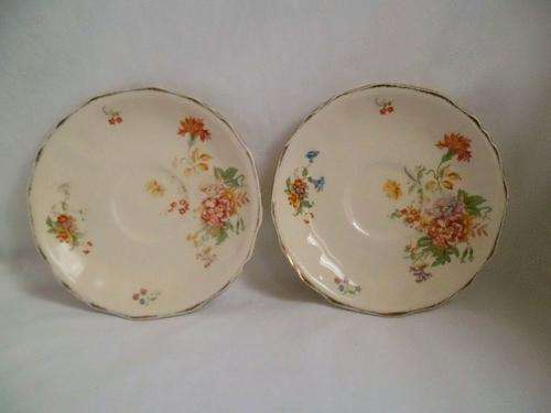 NOW REDUCED BY 50 %! TWO LOVELY VINTAGE *ALFRED MEAKIN* CREAM GOLD RIMMED FLORAL SAUCERS