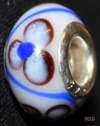 PANDORA STYLE MURANO GLASS BEADS - WHITE WITH BLUE SWIRL AND BROWN FLOWER