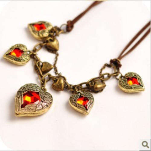 NECKLACE - ANGEL WINGS HEART IN BRONZE AND RED CRYSTALS WITH FAUX LEATHER