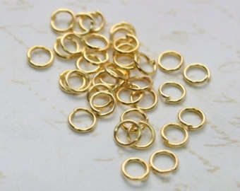 JUMP RINGS - 22 GAUGE - GOLD PLATED - 8 MM - SOLD PER PACK OF 50