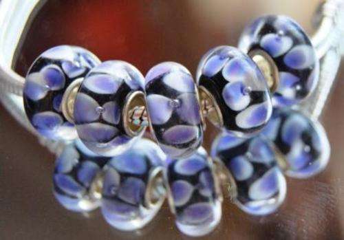 925 SILVER CORE - GLASS BEADS - CLEAR BLACK WITH LILAC/BLUE INNER FLOWER