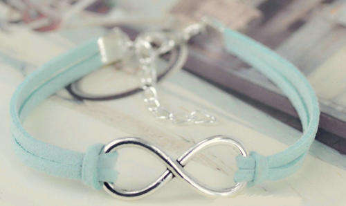 INFINITY FRIENDSHIP BRACELET - LIGHT BLUE SUEDE - SILVER PLATED WITH EXTENDER CHAIN