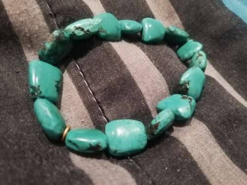 Elasticated turquoise gem stone bracelet, stones are not small.