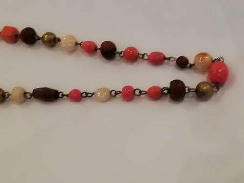 Vintage long necklace oranges and browns... Very 70s era