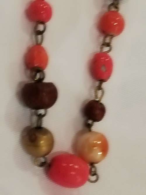 Vintage long necklace oranges and browns... Very 70s era
