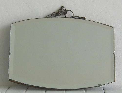 SMALL BEVELLED MIRROR ON WOODEN BACKING