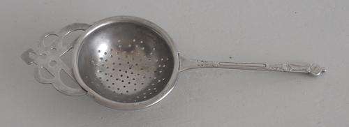 SILVER PLATED APOSTLE TEA STRAINER