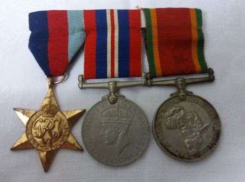 WW2 GROUP OF MEDALS -Africa Star & Service Medals awarded to H Coetzer