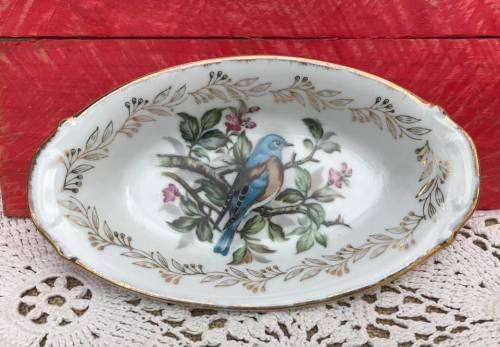 GILT RIMMED PORCELAIN DISH