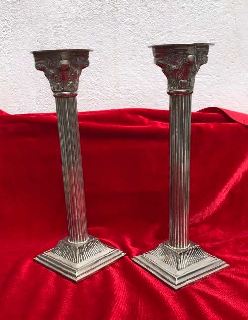 SILVER PLATED CANDLESTICKS heavy and tall