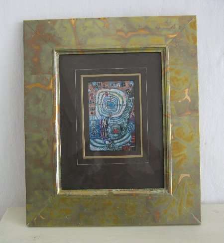 VARGATED GOLD FRAME WITH ABSTRACT PICTURE