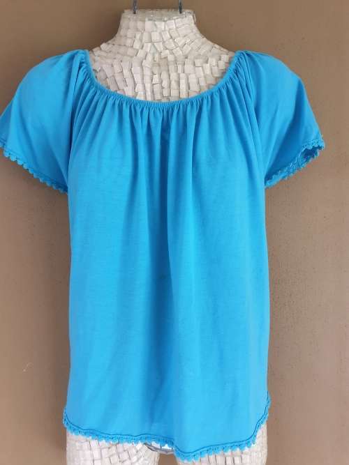 Pretty Turquoise Ladies Top with detail around sleeves and hemline Size 42