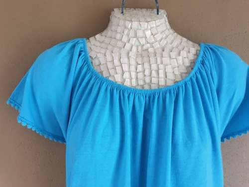Pretty Turquoise Ladies Top with detail around sleeves and hemline Size 42