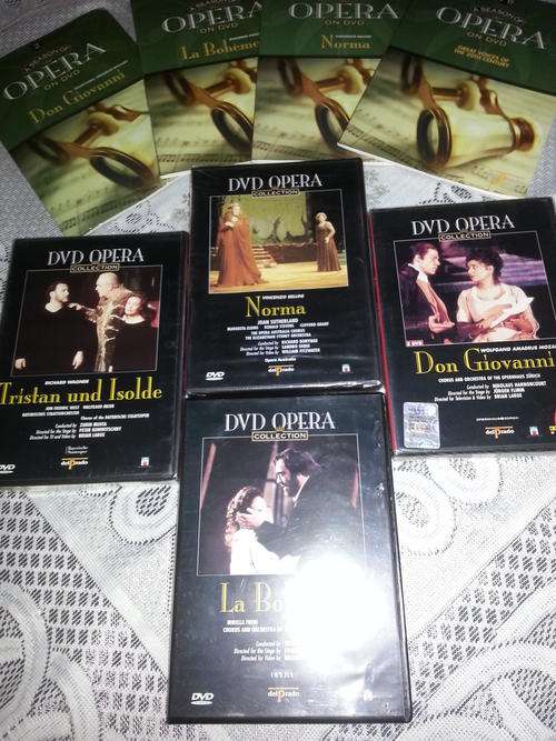 4 Opera DVD's plus 4 Opera booklet's, 3 of the DVD's still sealed, all for one price