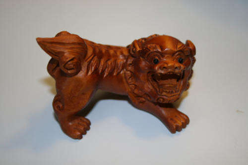 Exquisitely carved Foo Lion Netsuke (Male)