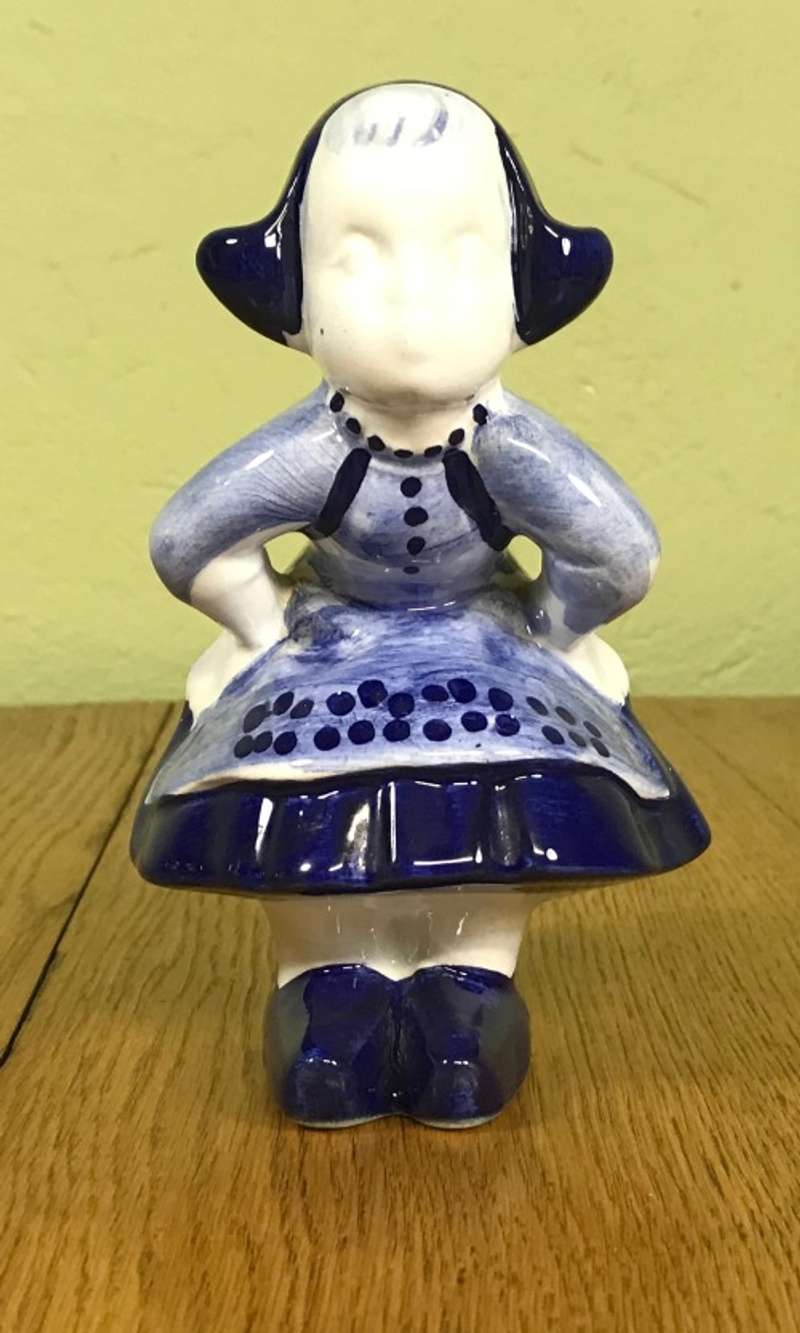 DUTCH GIRL FIGURINE PORCELAIN BLUE AND WHITE Please Read description......