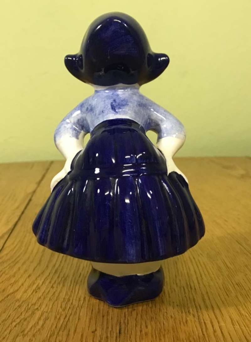 DUTCH GIRL FIGURINE PORCELAIN BLUE AND WHITE Please Read description......