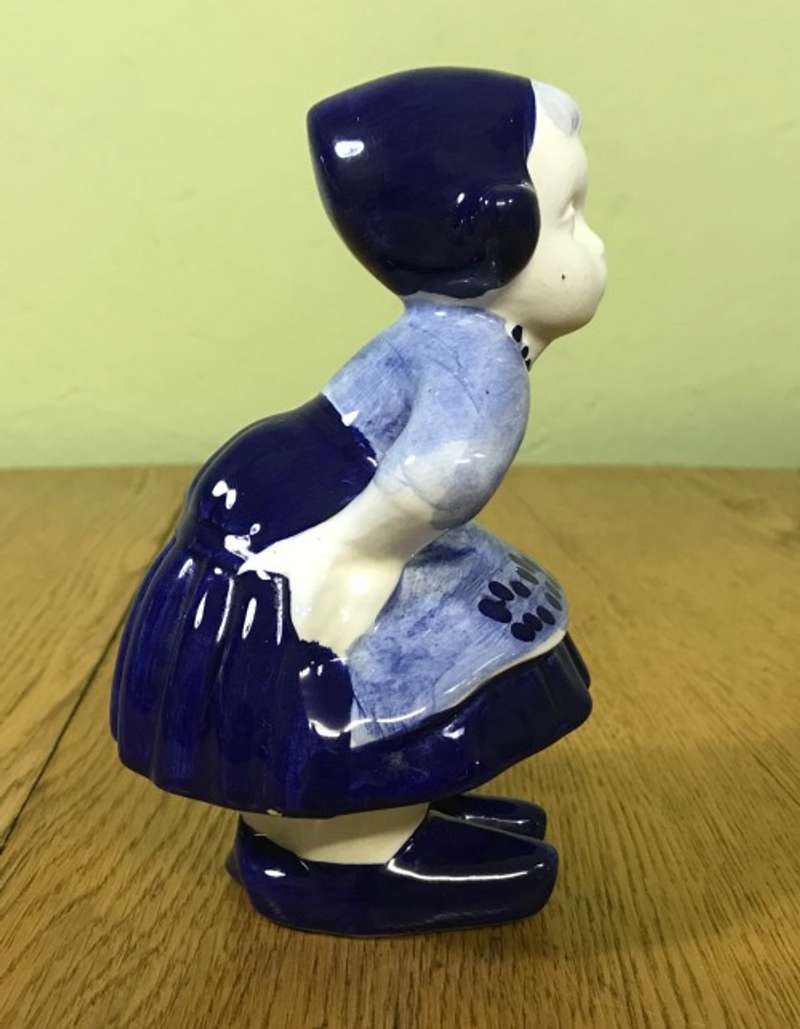 DUTCH GIRL FIGURINE PORCELAIN BLUE AND WHITE Please Read description......