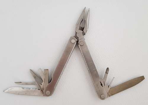 Leatherman Multi tool in pouch as per photo