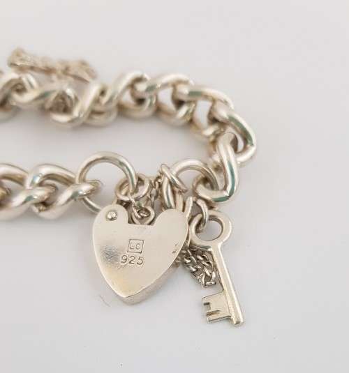 925 Sterling Silver Charm Bracelet weight 35,1g as per photo