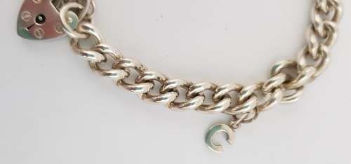 925 Sterling Silver Charm Bracelet weight 35,1g as per photo