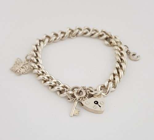 925 Sterling Silver Charm Bracelet weight 35,1g as per photo