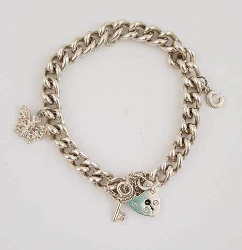 925 Sterling Silver Charm Bracelet weight 35,1g as per photo