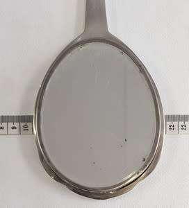 Silver hand held mirror - as per scan