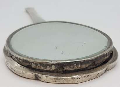Silver hand held mirror - as per scan