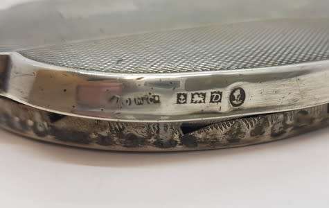 Silver hand held mirror - as per scan