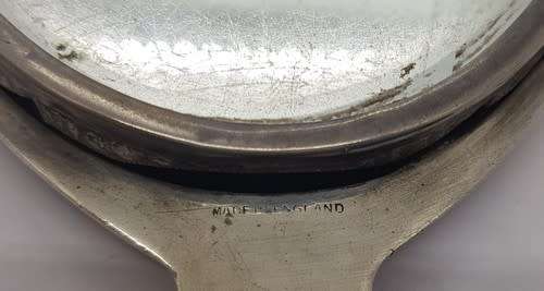 Silver hand held mirror - as per scan