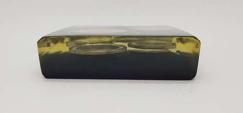 Lot of 4 Uruguay coins set in resin as per photo