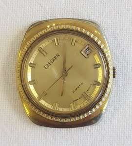 Citizen wind up mens watch - no strap and cracked glass - as per photo
