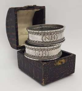 Pair of Antique Napkin Rings in original box 800 silver weight 35g as per photo