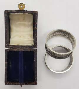 Pair of Antique Napkin Rings in original box 800 silver weight 35g as per photo