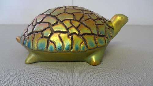Porcelain turtle made in Hungary with distinctive shell as per photo