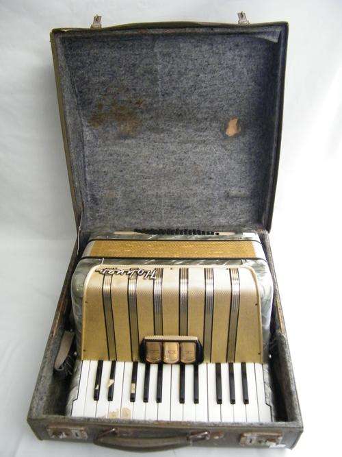 Hohner Accordian with 16 white and 10 black keys in case - enquire about postage - as per photo